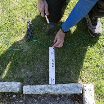 Legg ut avgrensningskabelen Legg ut avgrensningskabelen